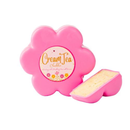 A white background image of a flower shaped cream tea cheese truckle in pink wax