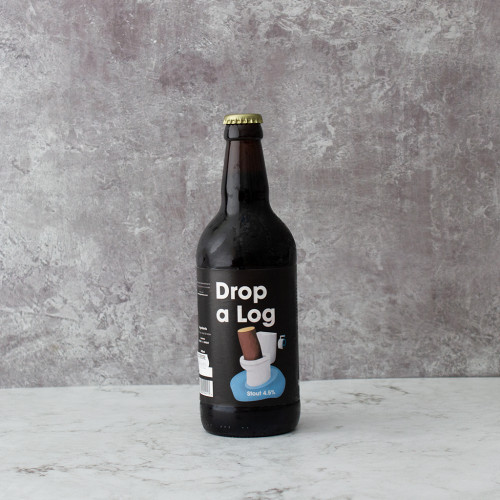 Grey background image product shot of the Drop A Log Comedy Beer