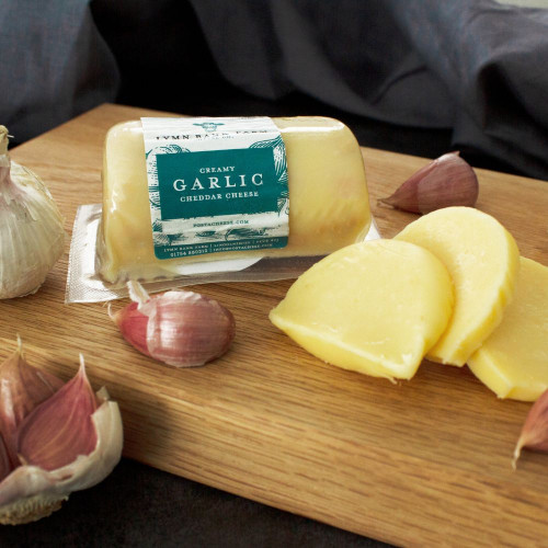 Lifestyle image of the Garlic Cheddar Cheese Barrel
