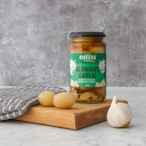 A lifestyle image of the Glorious Garlic pickled onions by the chuckling cheese company.