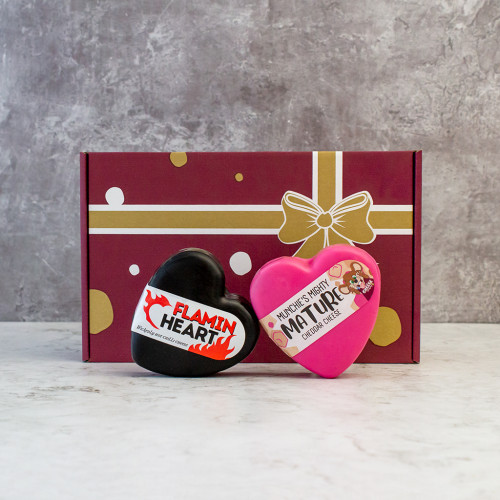 White background image of the Love Cheese Gift Box with Flamin Heart Cheddar Truckle and Munchies Mighty Mature Cheddar 