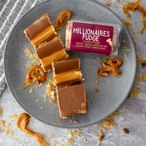 Lifestyle image of the Millionaire Fudge Bar drizzled with caramel sauce