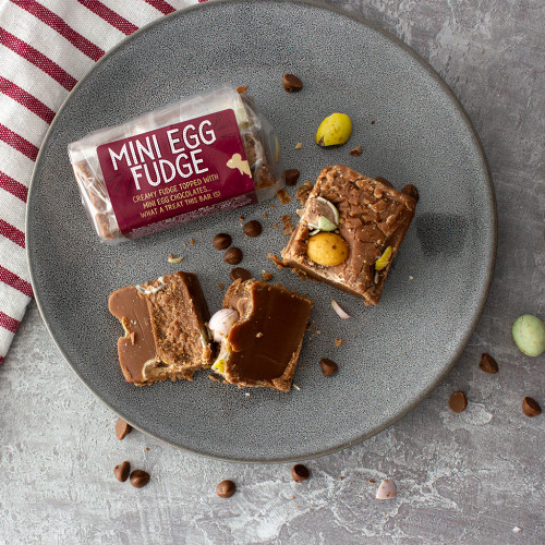 Lifestyle image of the Mini Egg Fudge Bar decorated with mini eggs