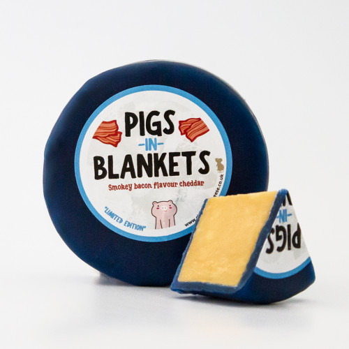 White background image of the Pigs in Blankets Limited Edition Smoky Bacon Flavour Cheddar Cheese Truckle
