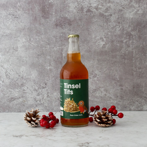 Grey background image of a single bottle of Tinsel Tits Cider